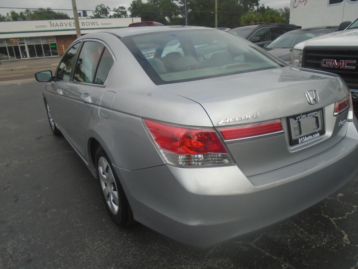 2012 Silver Honda Accord LX Sedan AT (1HGCP2F34CA) with an 2.4L L4 DOHC 16V engine, 5-Speed Automatic transmission, located at 6112 N Florida Avenue, Tampa, FL, 33604, (888) 521-5131, 27.954929, -82.459534 - Photo#4